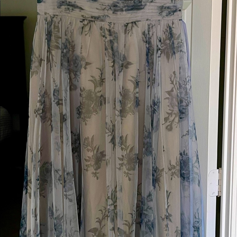 Brand new never worn size 12 wedding/ bridesmaid dress.